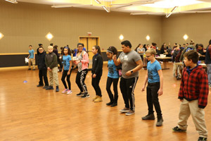 Eastern volunteers teach Windham Middle School students the importance of exercise through dance moves