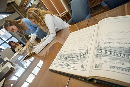 Students examining old documents