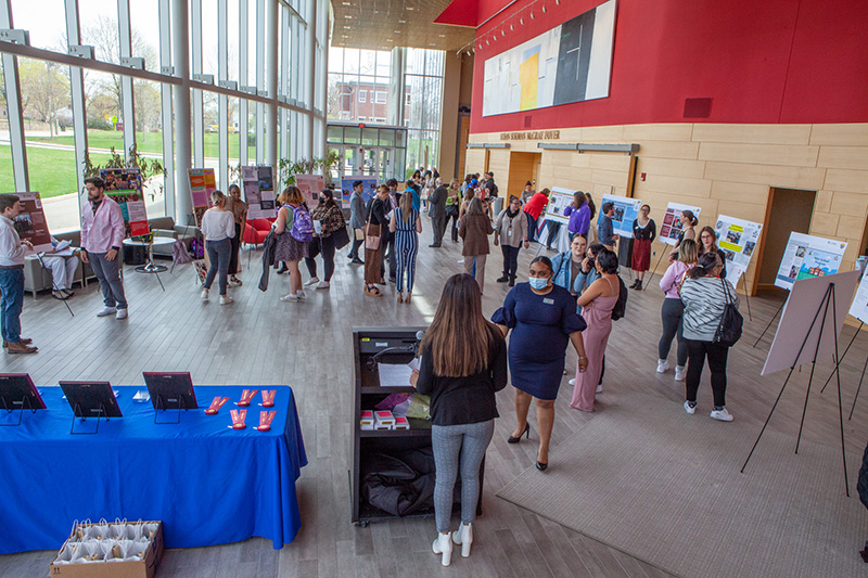Eastern students, faculty and staff gather in the Fine Arts Instructional Center (FAIC). 