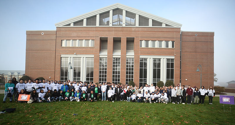 Student-volunteers line up outside of the J. Eugene Smith Library to kick off the event.