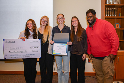 The "Glass Half Full" team celebrates its first-place recognition at the third annual "Big Idea Pitch Competition."