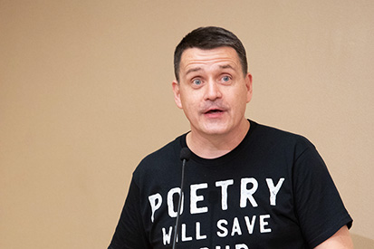 Donaghy speaks at a creative writing event in the Student Center Betty Tipton Room.