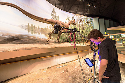 A student conducts research at Dinosaur State Park in Rocky Hill, CT.