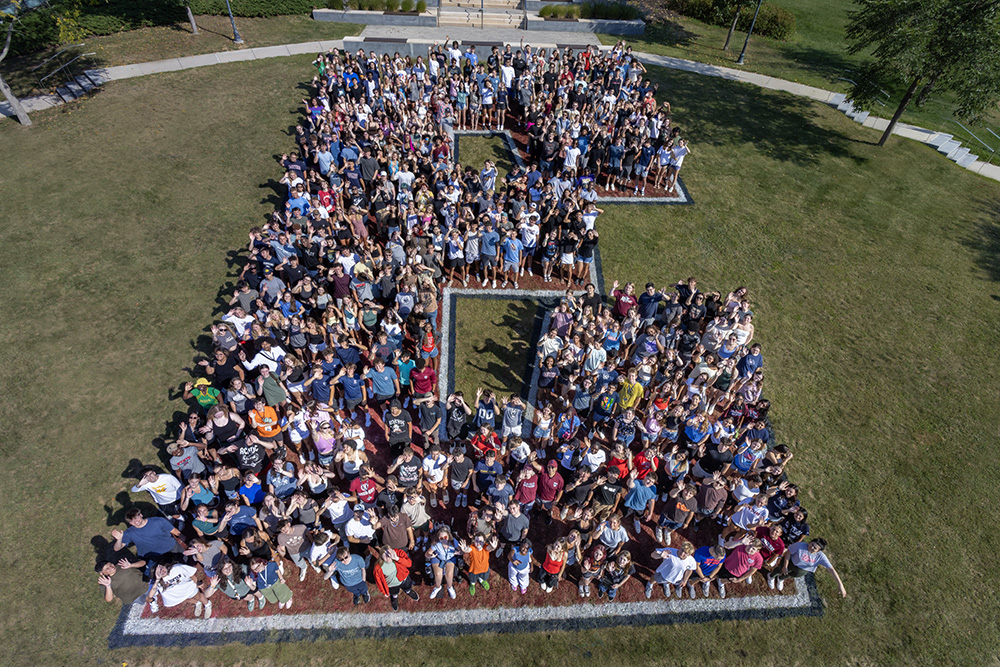 Incoming students pose for a group photo.
