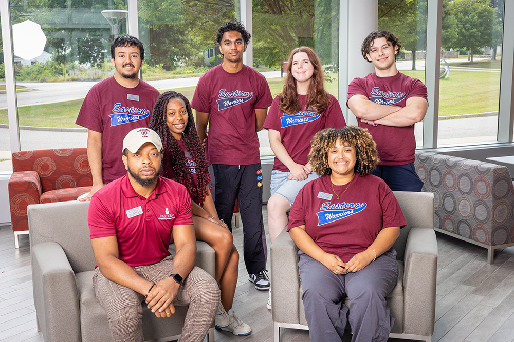 Residential Life Coordinator Emmanuel Augustin with six RAs.