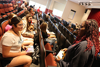 Dean of Students Kemesha Wilmot addresses STEP/CAP kids.