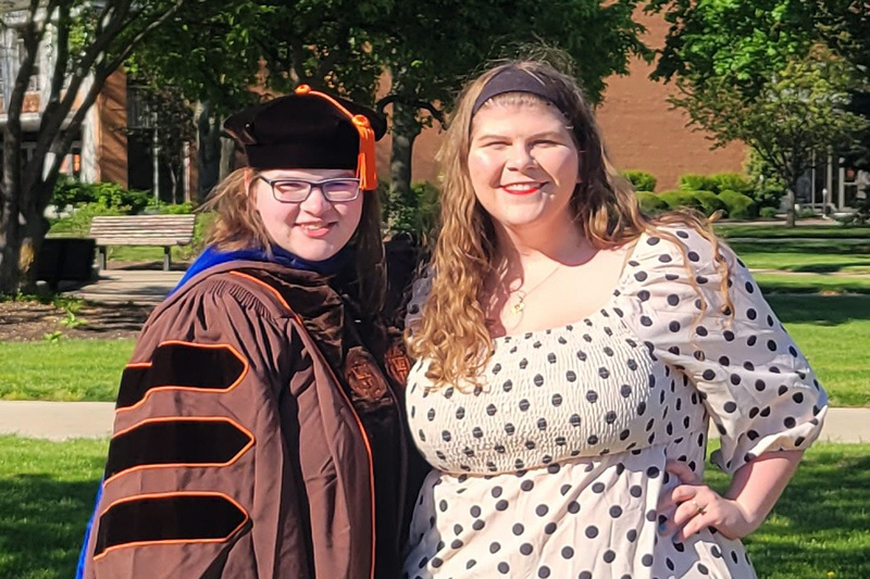 Renee (left) and Erin Drouin at Renee's Ph.D. graduation at Bowling Green State University.