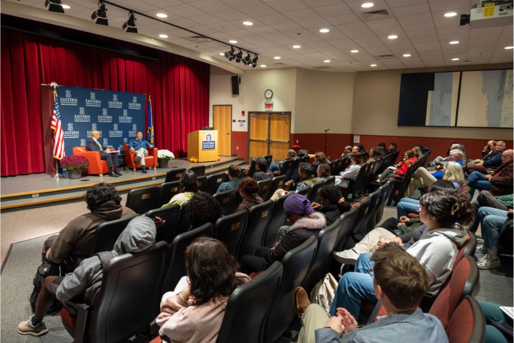 Tong and Ismaili speak to a full Student Center Theater audience.