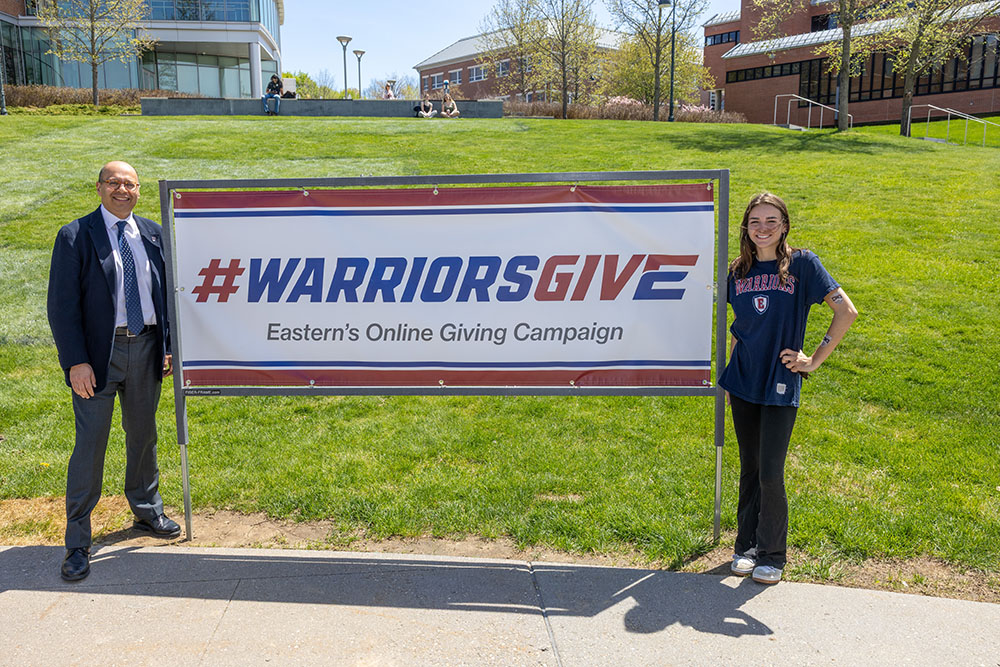 Eastern President Karim Ismaili (left) and Molly Maguder, lead student worker for alumni events and engagement.