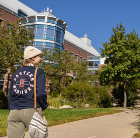 student walking on campus