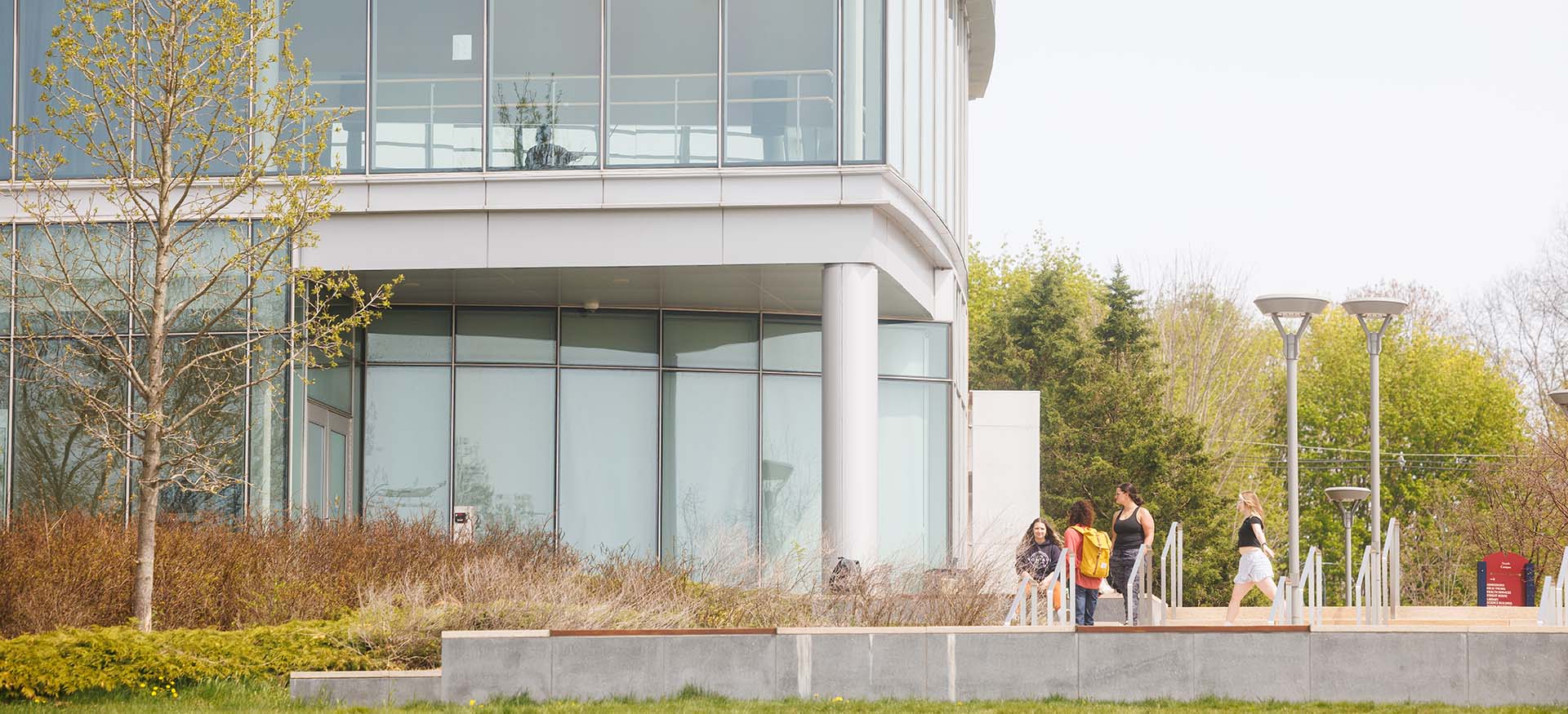 students walking outside of the Fine Arts Instructional Center