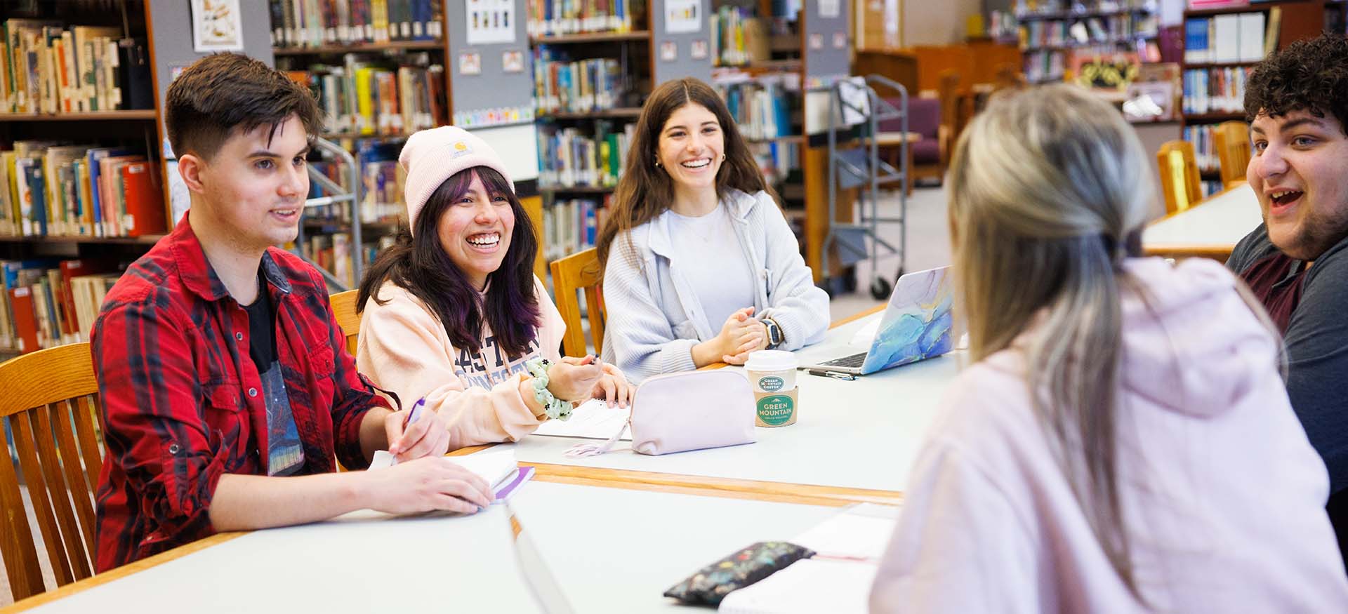 students hanging out in the library