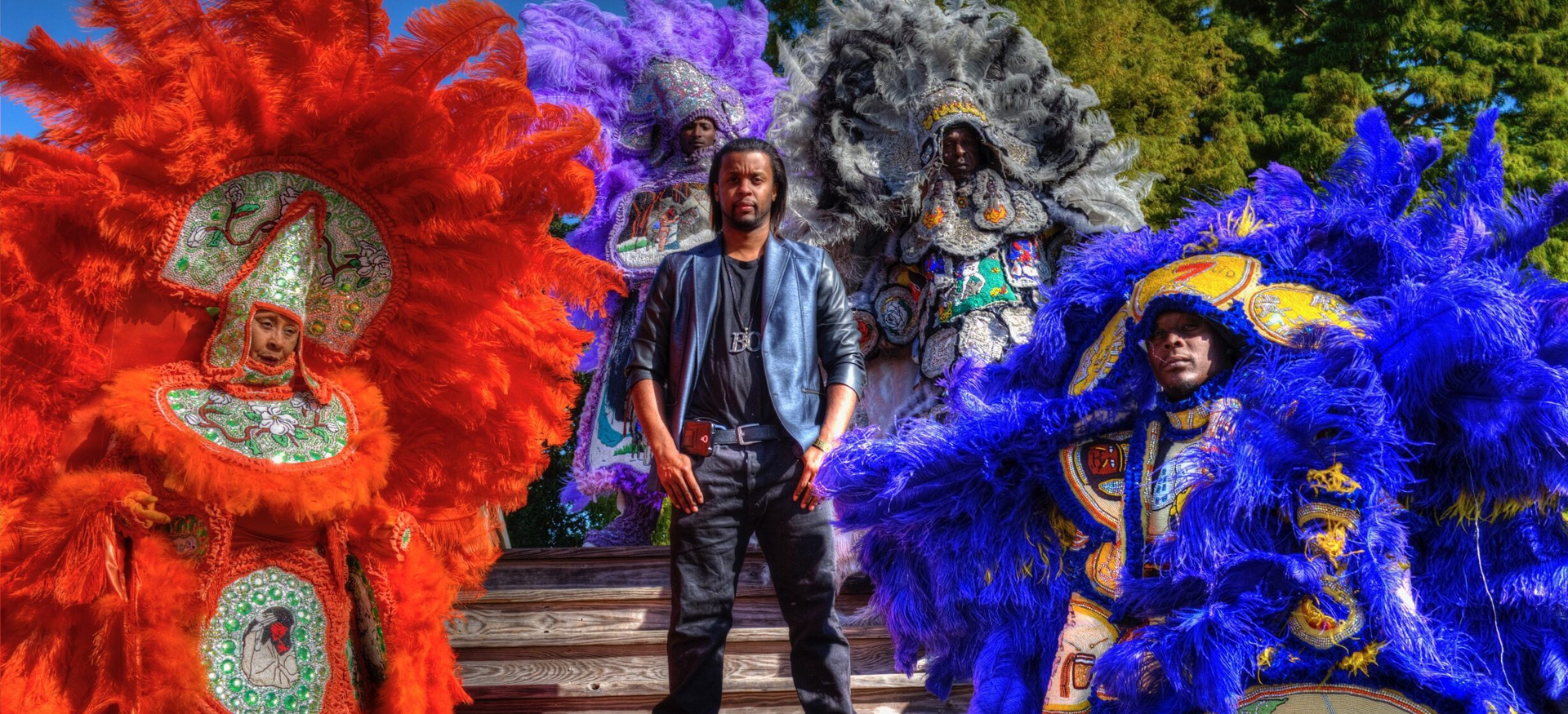 Take Me to the River All-Stars dressed in colorful, elaborate outfits