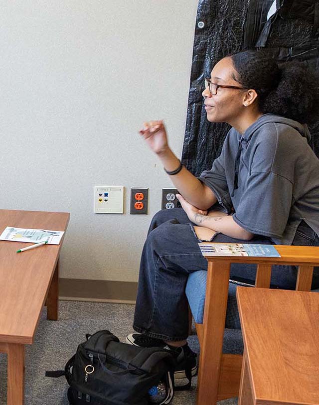 student and nun talking