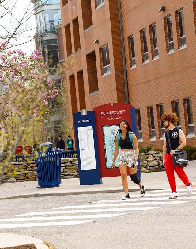 students walking on a crosswalk