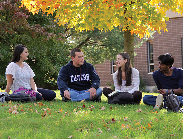 Students in a circle conversing