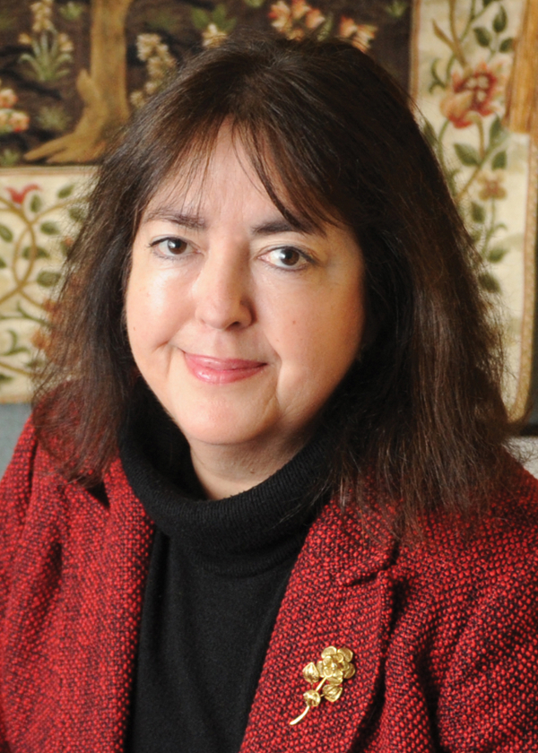 Carmen Cid, Dean of Arts and Sciences, retired 2021