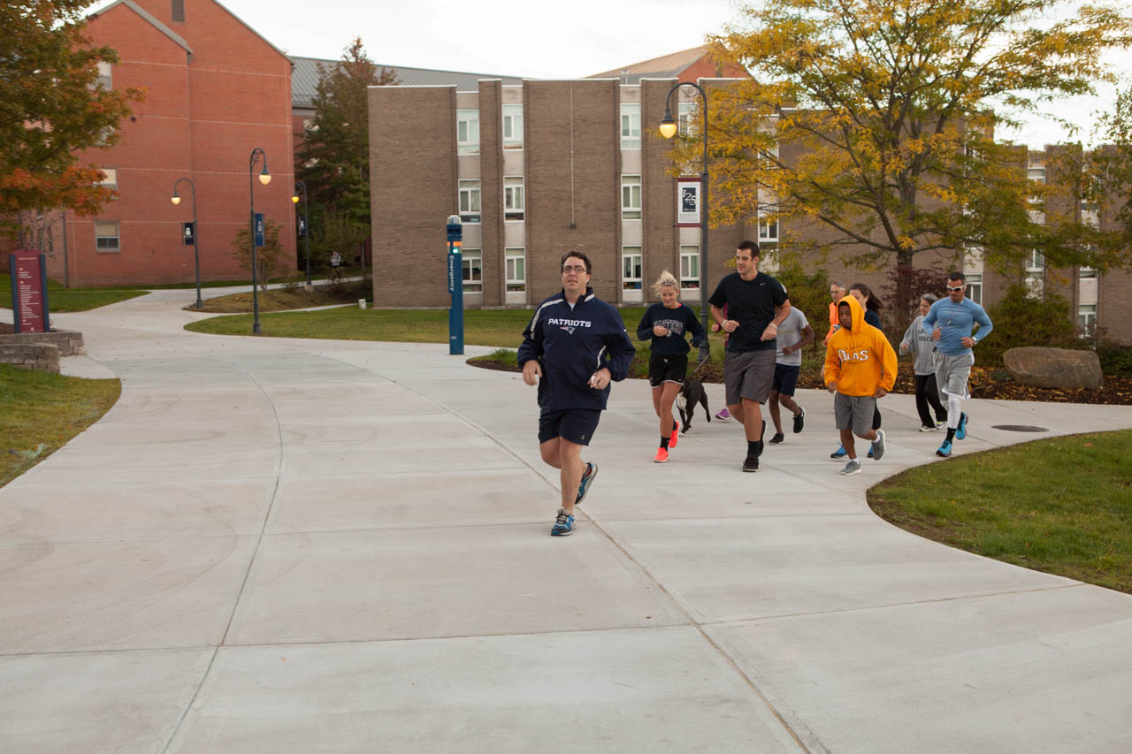 Faculty, staff and students jogging group exercising on Eastern's campus.