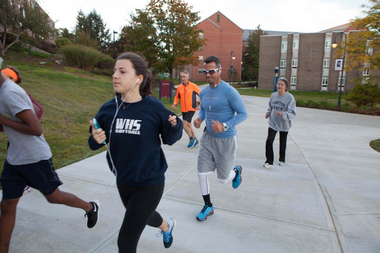 Faculty, staff and students jogging group exercising on Eastern's campus.