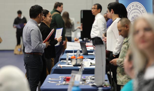 Students and employers at a career fair