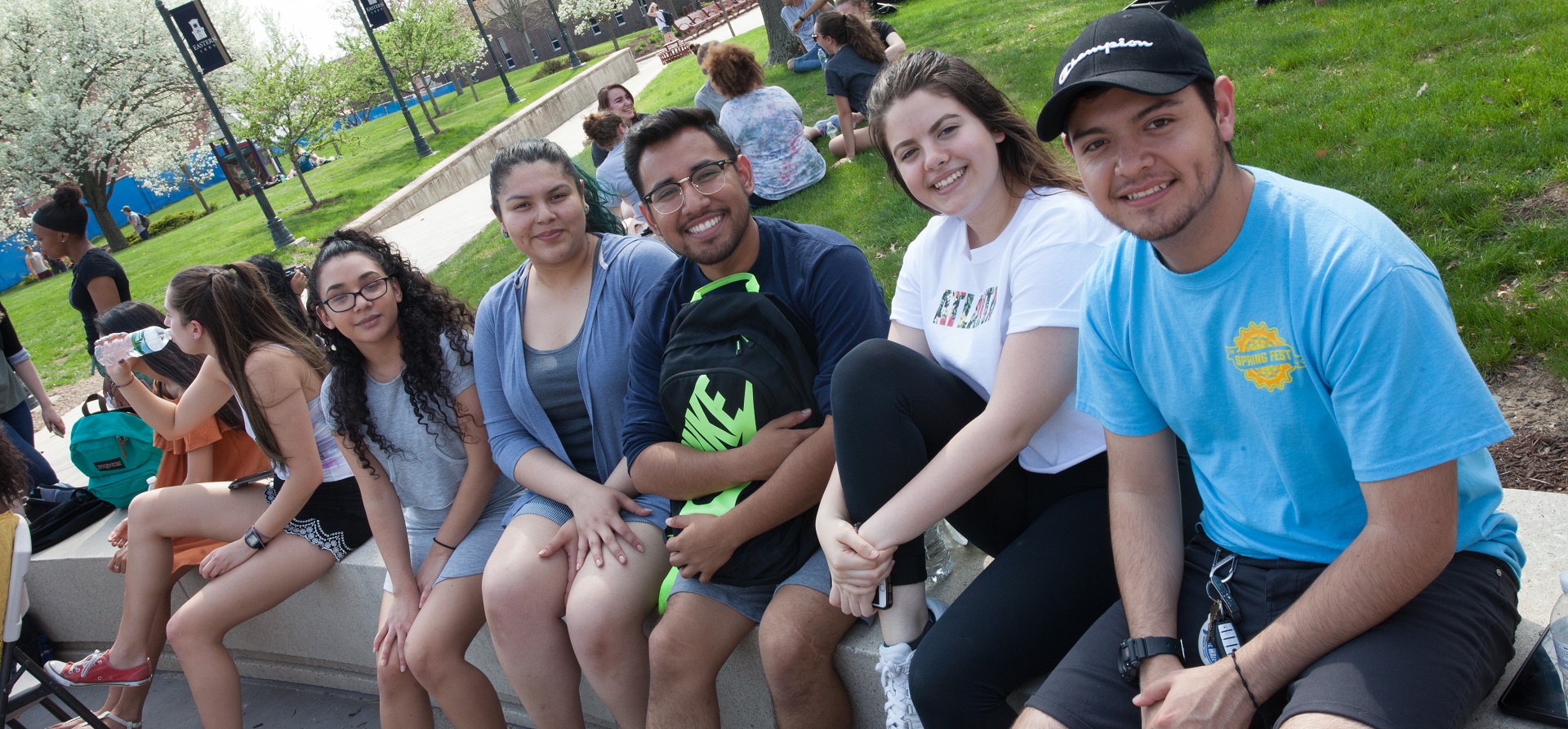 Students sitting outside Student Center.