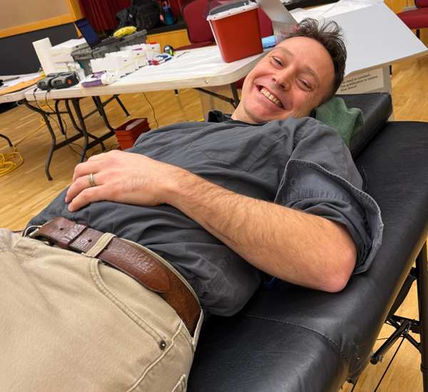 Eastern staff member donating blood