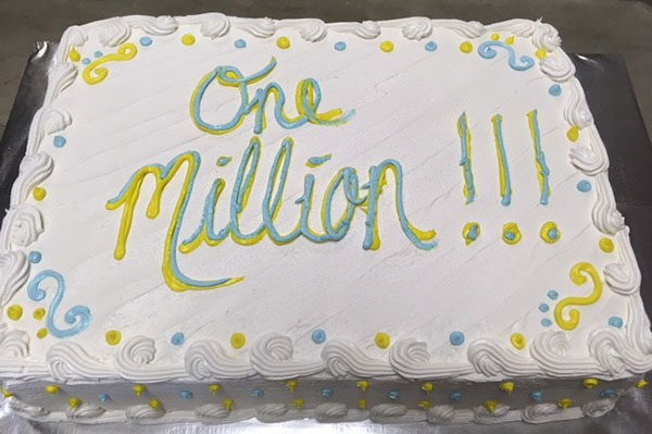 Cake with icing that says "One Million Views"