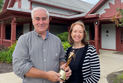 Editor Ken Measimer and producer Julia DeLapp pose with Telly award