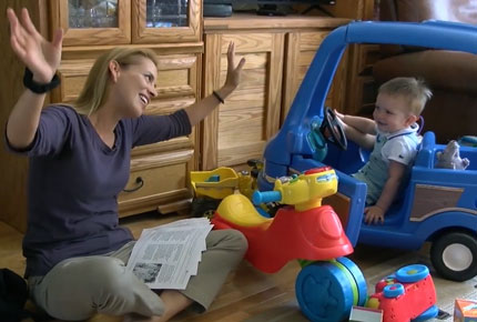  mother playing with son 