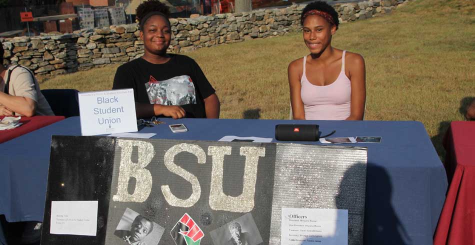 students at recruitment booth