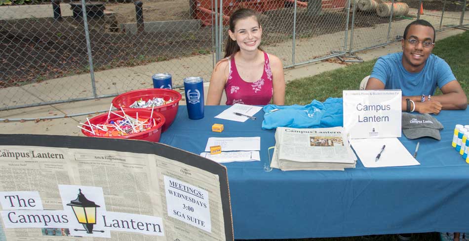 members at recruitment booth