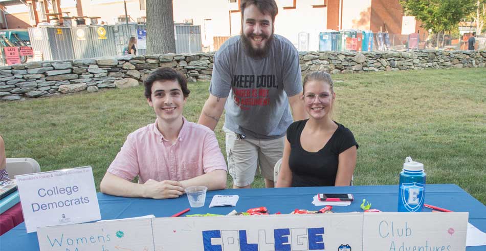 members at recruitment booth