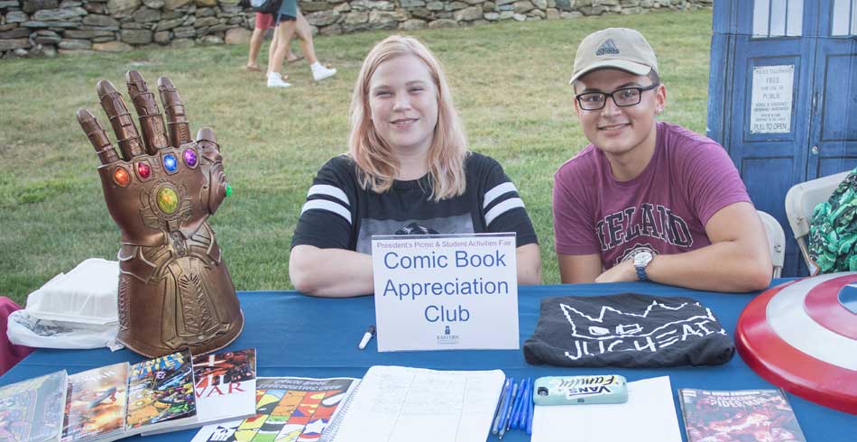 members at recruitment booth