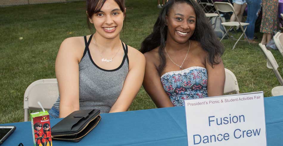 members at recruitment booth