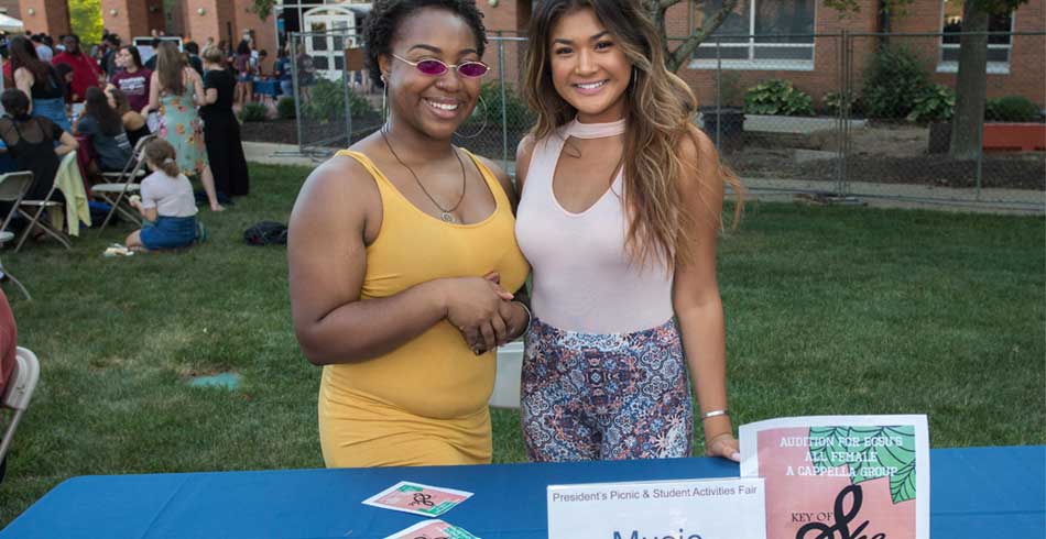 members at recruitment booth