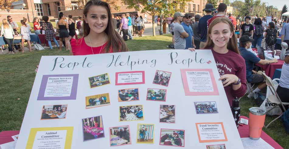 members at recruitment booth