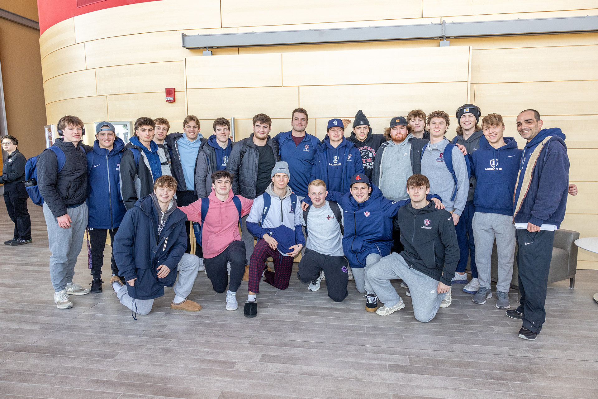 members of the Eastern Lacrosse team posing with Erik