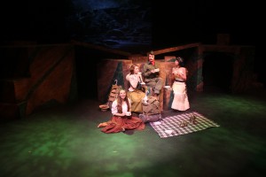 student actors having a picnic on stage