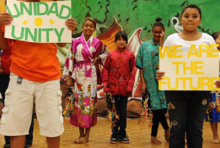 Children holding signs