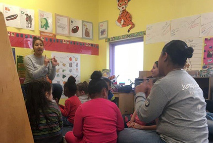 Student teaching children