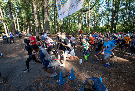 racers passing a checkpoint during the Andrej 5K race