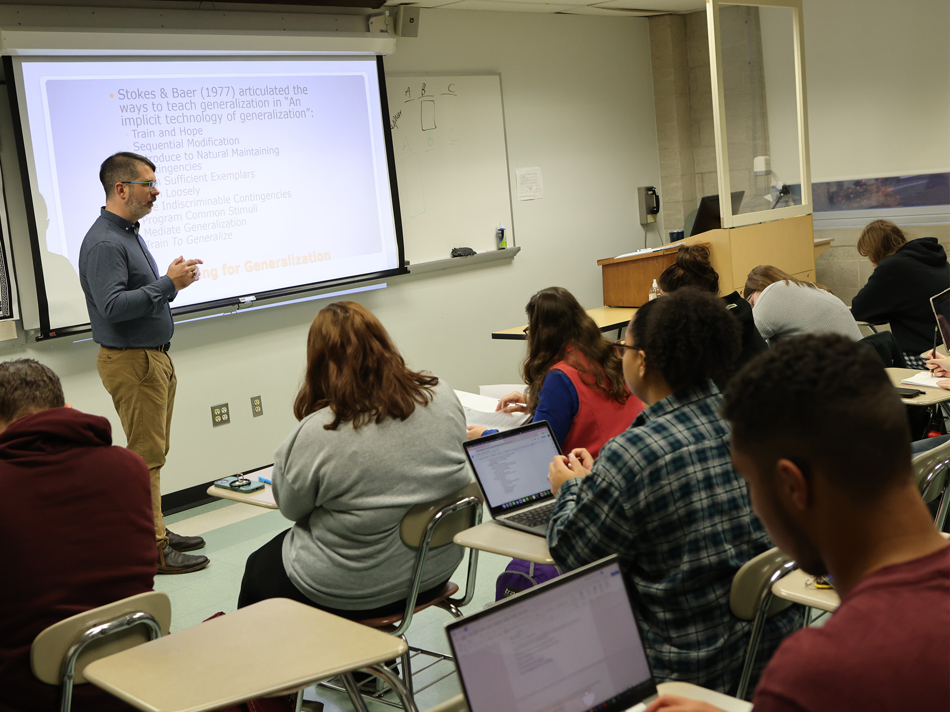 James Diller teaching in front of class