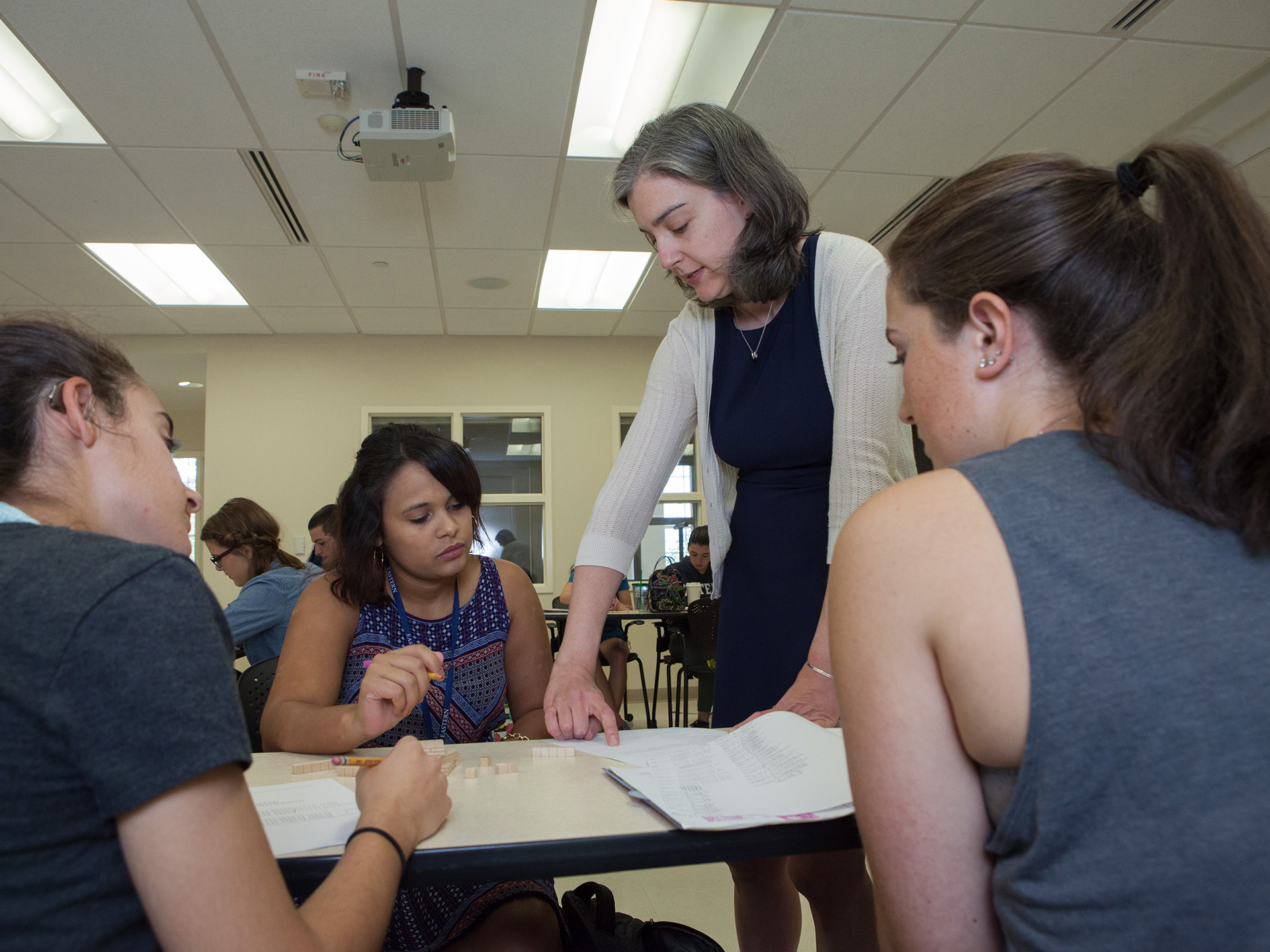 Megan Heenehan talking with students during class