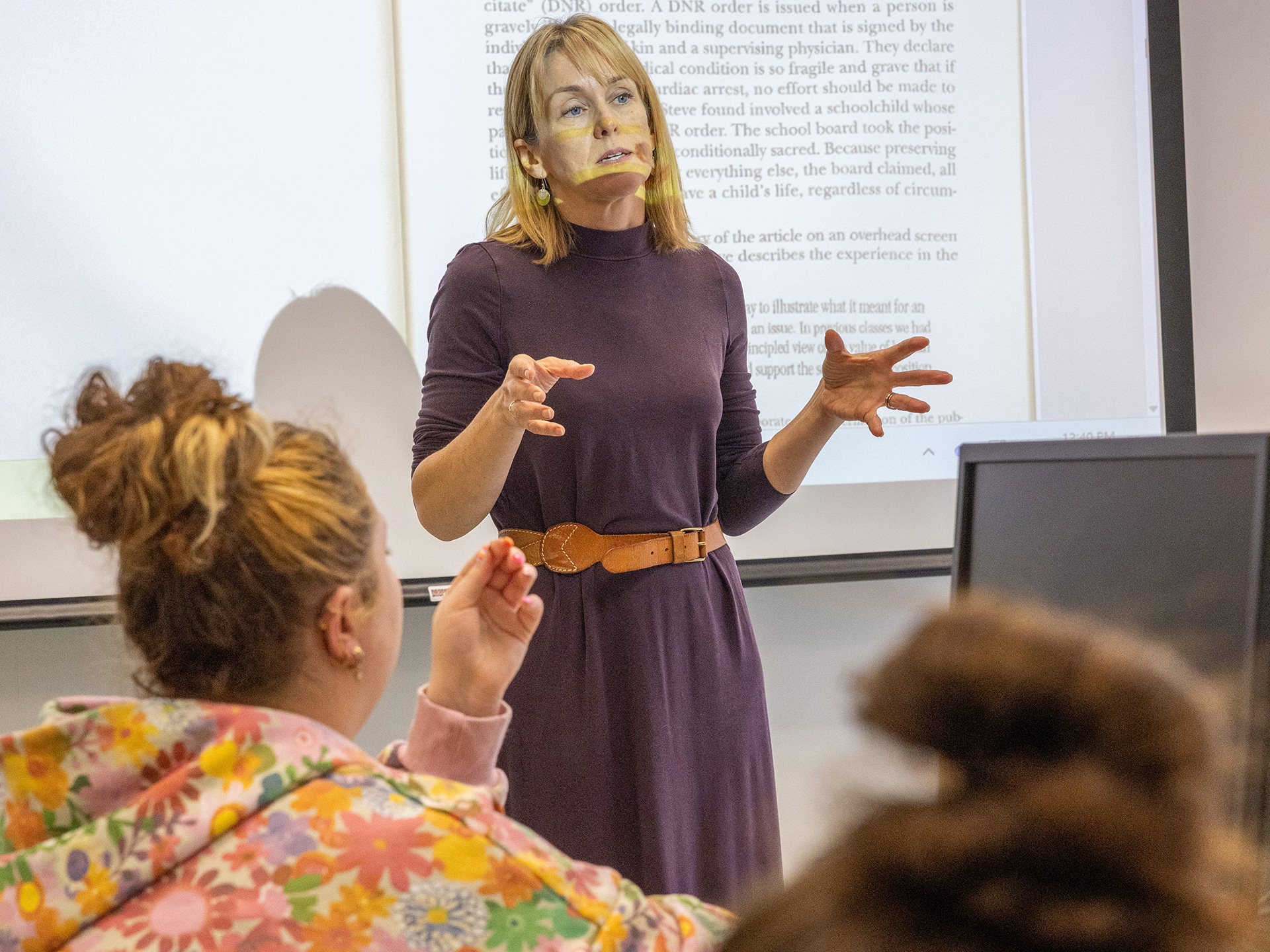 Sarah Moon teaching in front of class