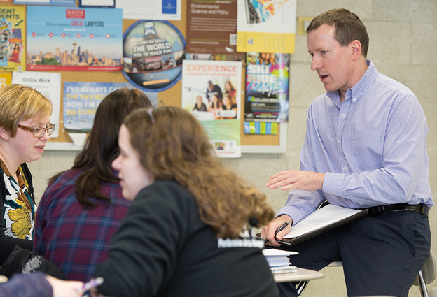 teacher showing example of work