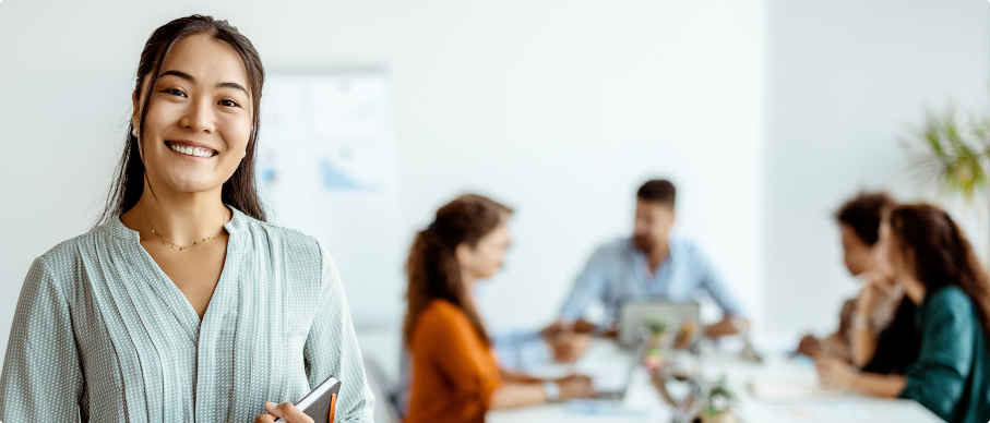 Image of a manager in a conference room.