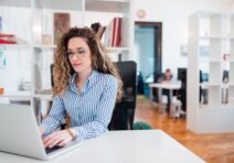 Female accounting professional working in an office space.