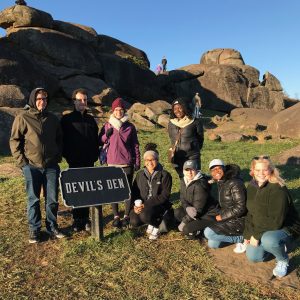Students pause for a much happier photo at Devil’s Den. Students pictured: Allen Horn, Omar Abdelsame, Jacquelin Bessette, Ailyn Dilone, Uriya Simeon, Olivia Barki, Dianiley Deslandes, and Margaret Conroy.