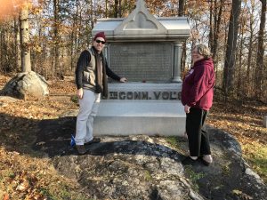 Dr. Balcerski and Dr. Tucker lay a flower at the memorial to the 5th Connecticut Volunteer Regiment, mustered out of Hartford.