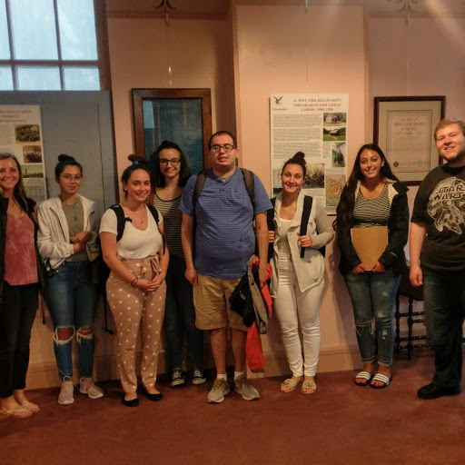 Group shot of tour attendees inside the museum